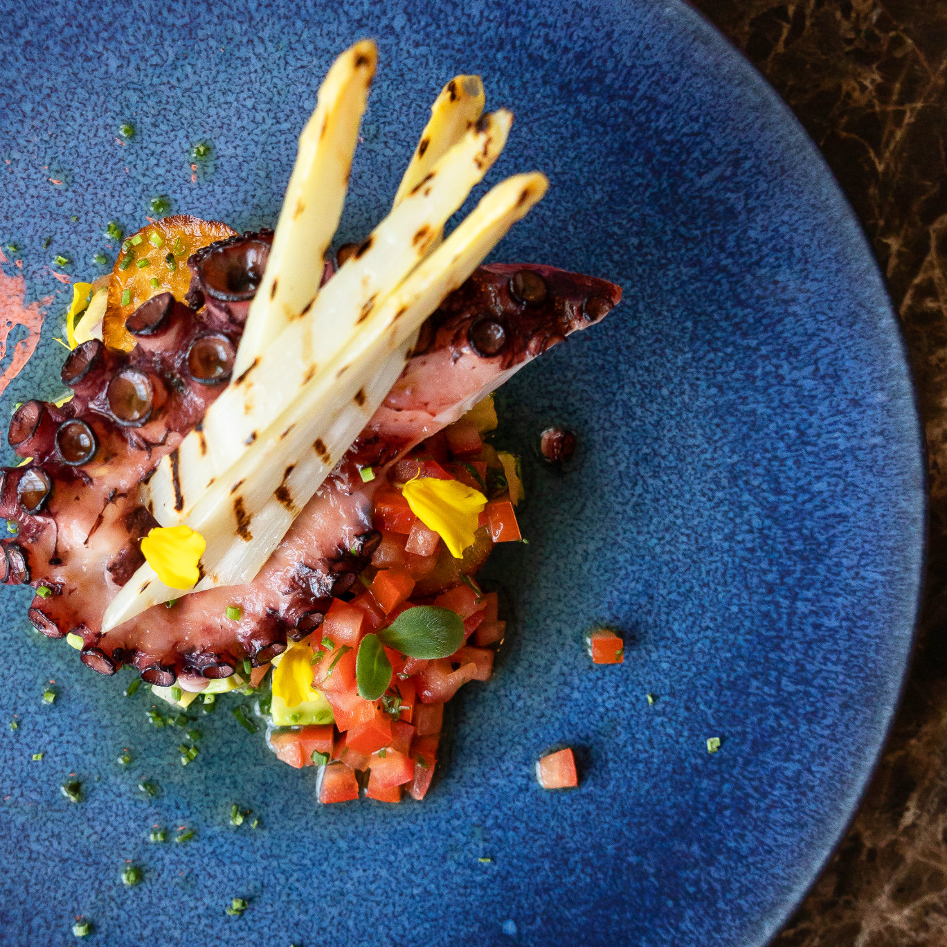 Akla Grilled octopus, white asparagus, sautéed sweet potatoes and avocado